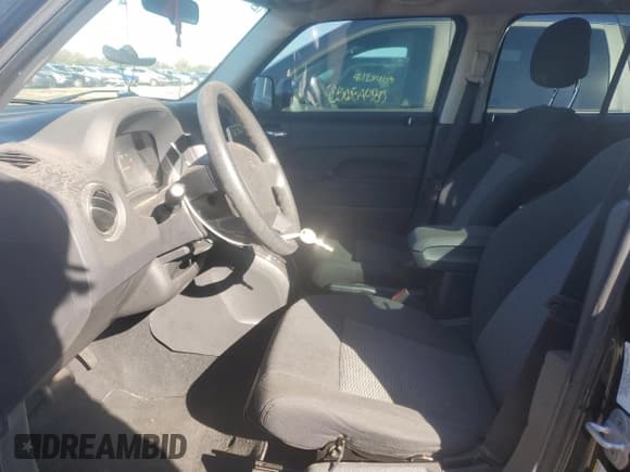 ✅ 2010 Jeep Patriot Sport • VIN: 1J4NF2GB1AD582637 • Lot: 84618285. Listed on Copart with 110,264 mi. Free auction sales archive from the USA and detailed vehicle history report at DreamBid. Image 7.