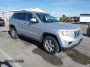 ✅ 2013 Jeep Grand Cherokee Laredo • VIN: 1C4RJFAG8DC607593 • Lot: 43643452. Listed on IAAI with 168,356 mi. Free auction sales archive from the USA and detailed vehicle history report at DreamBid. Image 1.