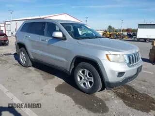 ✅ 2013 Jeep Grand Cherokee Laredo • VIN: 1C4RJFAG8DC607593 • Lot: 43643452. Listed on IAAI with 168,356 mi. Free auction sales archive from the USA and detailed vehicle history report at DreamBid. Image 1.