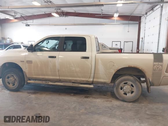 ✅ 2012 Ram 2500 SLT • VIN: 3C6TD5DT8CG141313 • Лот: 43446941. Опубликован ранее на IAAI с пробегом 215 151 миль. Бесплатный доступ к архиву аукционных продаж из США и подробный отчёт об истории автомобиля на DreamBid. Изображение 14.