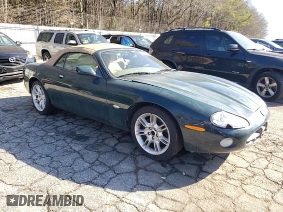 ✅ 2001 Jaguar XK • VIN: SAJDA42CX1NA22450 • Лот: 43019265. Опубликован ранее на Copart с пробегом 109 090 миль. Бесплатный доступ к архиву аукционных продаж из США и подробный отчёт об истории автомобиля на DreamBid. Изображение 4.