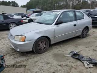 2002 Hyundai Accent GS z VIN KMHCG35CX2U210657, wystawiony jako Copart lot #85131504 z przebiegiem 91 354 mil mil oraz Czysty tytuł • Clean title. Historia ofert i sprzedaży dostępna na DreamBid. Obrazek 1.