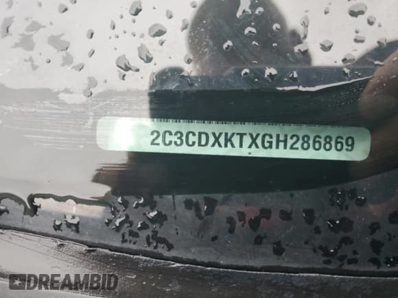 ✅ 2016 Dodge Charger Police • VIN: 2C3CDXKTXGH286869 • Lot: 58623795. Listed on Copart with 69,570 mi. Free auction sales archive from the USA and detailed vehicle history report at DreamBid. Image 12.