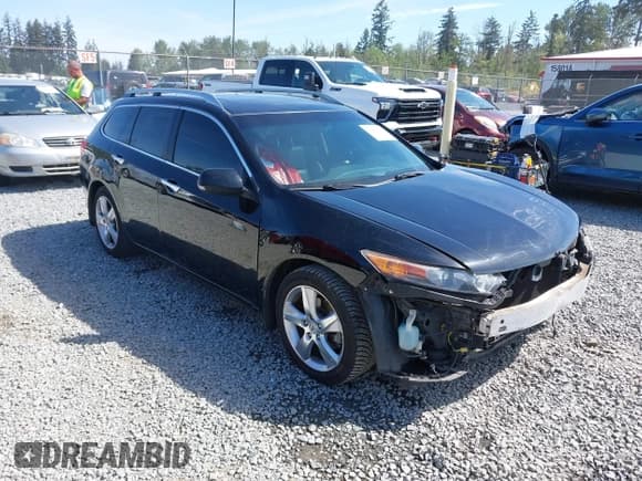 ✅ 2012 Acura TSX Technology • VIN: JH4CW2H64CC000956 • Lot: 42232413. Listed on IAAI with 146,238 mi. Free auction sales archive from the USA and detailed vehicle history report at DreamBid. Image 1.