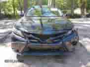 2022 Toyota Camry SE z VIN 4T1G11AK7NU068339, wystawiony jako IAAI lot #42534773 z przebiegiem 33 661 mil mil oraz . Historia ofert i sprzedaży dostępna na DreamBid. Obrazek 12.