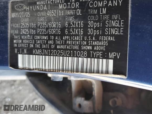 2005 Hyundai Tucson GLS with VIN KM8JN12D25U211028, listed as a Copart auction lot 91035095 with 187,604 mi miles and Salvage title. Bid and sale history available at DreamBid. Image 12.