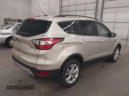 ✅ 2017 Ford Escape SE • VIN: 1FMCU9GD9HUC55311 • Lot: 43468403. Listed on IAAI with 117,889 mi. Free auction sales archive from the USA and detailed vehicle history report at DreamBid. Image 4.