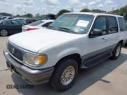 ✅ 1999 Mercury Mountaineer • VIN: 4M2ZU52E4XUJ30796 • Лот: 42925134. Опубликован ранее на IAAI с пробегом 302 669 миль. Бесплатный доступ к архиву аукционных продаж из США и подробный отчёт об истории автомобиля на DreamBid. Изображение 2.