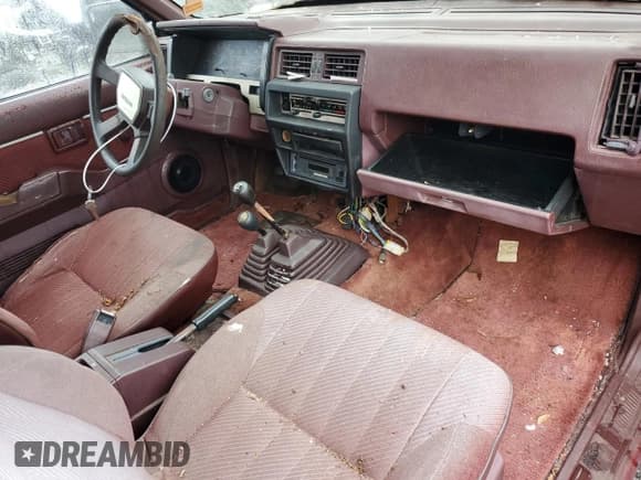 ✅ 1986 Nissan Navara • VIN: JN6HD16Y7GW000740 • Lot: 79209454. Wystawiony na Copart z przebiegiem 279 368 mil. Bezpłatny archiwum sprzedaży aukcyjnych z USA i szczegółowy raport historii pojazdu na DreamBid. Zdjęcie 8.