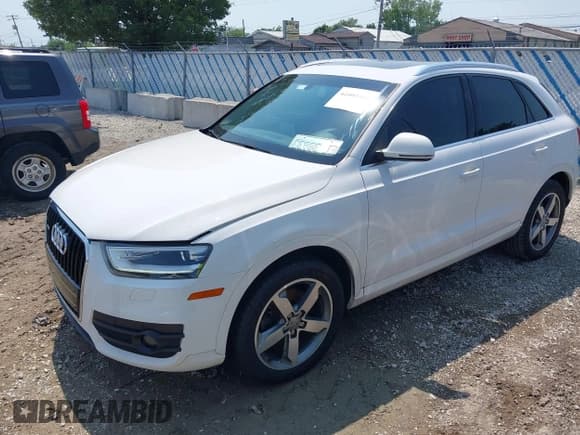 ✅ 2015 Audi Q3 Prestige • VIN: WA1GFCFSXFR004918 • Lot: 42861122. Listed on IAAI with 118,316 mi. Free auction sales archive from the USA and detailed vehicle history report at DreamBid. Image 2.