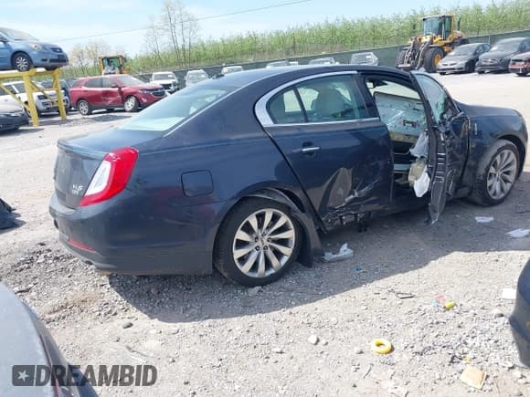 ✅ 2014 Lincoln MKS • VIN: 1LNHL9EK1EG606152 • Lot: 42104079. Listed on IAAI with 165,034 mi. Free auction sales archive from the USA and detailed vehicle history report at DreamBid. Image 4.