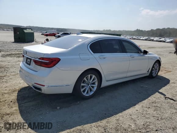 ✅ 2017 BMW 7 Series 740i • VIN: WBA7E2C5XHG739931 • Lot: 81453395. Listed on Copart with 121,438 mi. Free auction sales archive from the USA and detailed vehicle history report at DreamBid. Image 3.