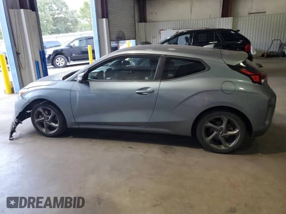 2019 Hyundai Veloster 2.0 с VIN KMHTG6AF3KU018563, выставлен на аукционе Copart как лот 74105094 с пробегом 75 578 миль миль и Списание • Salvage title. История ставок и продаж доступна на DreamBid. Изображение 2.