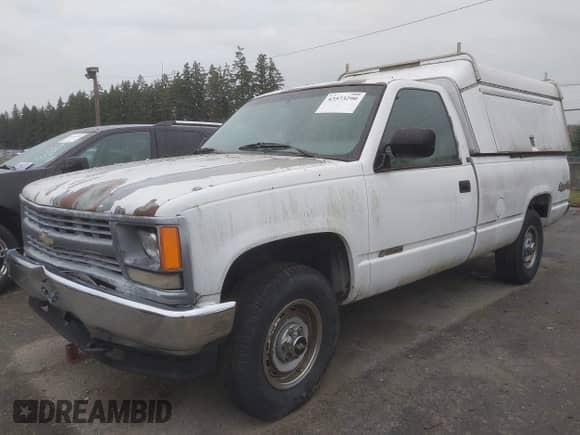 1994 Chevrolet Silverado 1500 z VIN 1GCEK14Z9RZ113856, wystawiony jako IAAI lot #43573290 z przebiegiem 247 761 mil mil oraz . Historia ofert i sprzedaży dostępna na DreamBid. Obrazek 2.