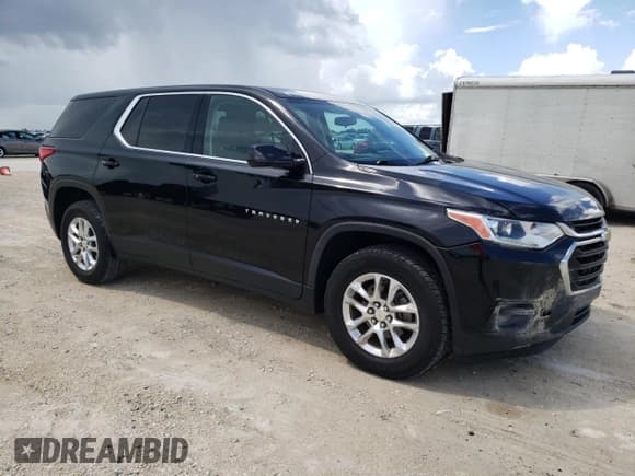✅ 2018 Chevrolet Traverse LS • VIN: 1GNERFKW8JJ136279 • Lot: 69132134. Wystawiony na Copart z przebiegiem 138 504 mil. Bezpłatny archiwum sprzedaży aukcyjnych z USA i szczegółowy raport historii pojazdu na DreamBid. Zdjęcie 4.