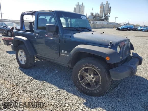 ✅ 2007 Jeep Wrangler X • VIN: 1J4FA241X7L132899 • Lot: 56553345. Listed on Copart with 154,085 mi. Free auction sales archive from the USA and detailed vehicle history report at DreamBid. Image 4.