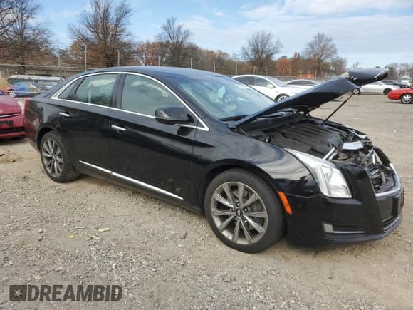 ✅ 2017 Cadillac XTS • VIN: 2G61L5S32H9128230 • Лот: 81761074. Опубликован ранее на Copart с пробегом 82 118 миль. Бесплатный доступ к архиву аукционных продаж из США и подробный отчёт об истории автомобиля на DreamBid. Изображение 4.