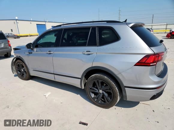 ✅ 2024 Volkswagen Tiguan SE R-Line Black • VIN: 3VVCB7AX7RM054192 • Лот: 71907165. Опубликован ранее на Copart с пробегом 20 299 миль. Бесплатный доступ к архиву аукционных продаж из США и подробный отчёт об истории автомобиля на DreamBid. Изображение 2.