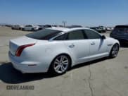✅ 2015 Jaguar XJ • VIN: SAJWA1CZ4F8V87421 • Лот: 62788315. Опубликован ранее на Copart с пробегом 66 347 миль. Бесплатный доступ к архиву аукционных продаж из США и подробный отчёт об истории автомобиля на DreamBid. Изображение 3.