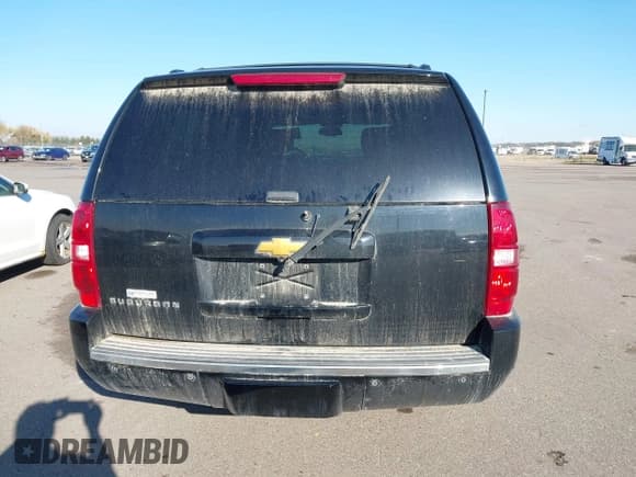 ✅ 2014 Chevrolet Suburban LTZ • VIN: 1GNSKKE74ER169548 • Lot: 43560269. Listed on IAAI with 255,008 mi. Free auction sales archive from the USA and detailed vehicle history report at DreamBid. Image 6.