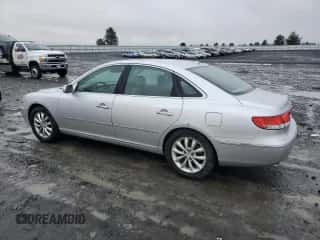 2007 Hyundai Azera SE z VIN KMHFC46F47A202070, wystawiony jako Copart lot #80811434 z przebiegiem 98 692 mil mil oraz Szkoda całkowita • Salvage title. Historia ofert i sprzedaży dostępna na DreamBid. Obrazek 2.