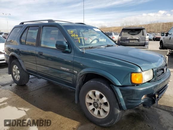 ✅ 1998 Honda Passport LX • VIN: 4S6CM58W2W4403473 • Lot: 66621474. Listed on Copart with 154,892 mi. Free auction sales archive from the USA and detailed vehicle history report at DreamBid. Image 4.