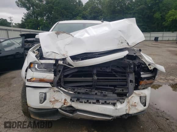 2018 Chevrolet Silverado 1500 LT с VIN 3GCUKREC5JG643220, выставлен на аукционе Copart как лот 58513625 с пробегом Не указан миль и Списание • Salvage title. История ставок и продаж доступна на DreamBid. Изображение 5.