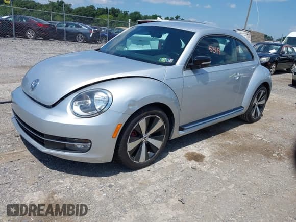 ✅ 2012 Volkswagen Beetle Turbo • VIN: 3VWVA7AT7CM616491 • Лот: 42855348. Опубликован ранее на IAAI с пробегом 117 496 миль. Бесплатный доступ к архиву аукционных продаж из США и подробный отчёт об истории автомобиля на DreamBid. Изображение 2.