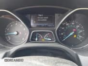 ✅ 2014 Ford Focus Titanium • VIN: 1FADP3N27EL114825 • Lot: 43217005. Listed on IAAI with 148,002 mi. Free auction sales archive from the USA and detailed vehicle history report at DreamBid. Image 7.