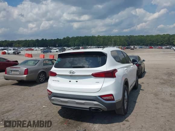 2019 Hyundai Santa Fe SE z VIN 5NMS2CAD6KH128817, wystawiony jako IAAI lot #43140291 z przebiegiem 111 336 mil mil oraz . Historia ofert i sprzedaży dostępna na DreamBid. Obrazek 4.