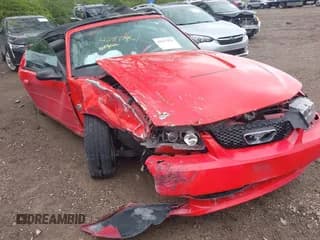 ✅ 2004 Ford Mustang Deluxe • VIN: 1FAFP44494F112900 • Lot: 42117976. Listed on IAAI with 58,963 mi. Free auction sales archive from the USA and detailed vehicle history report at DreamBid. Image 1.