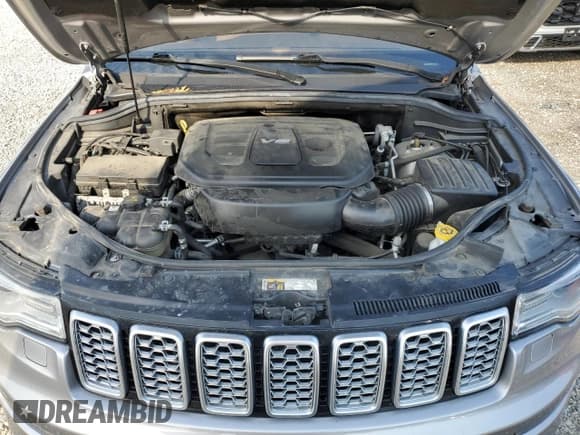✅ 2018 Jeep Grand Cherokee Summit • VIN: 1C4RJFJG7JC410684 • Lot: 70188035. Listed on Copart with 99,732 mi. Free auction sales archive from the USA and detailed vehicle history report at DreamBid. Image 12.