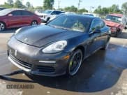 ✅ 2014 Porsche Panamera S E-Hybrid • VIN: WP0AD2A76EL044591 • Lot: 42436817. Wystawiony na IAAI z przebiegiem 89 009 mil. Bezpłatny archiwum sprzedaży aukcyjnych z USA i szczegółowy raport historii pojazdu na DreamBid. Zdjęcie 2.
