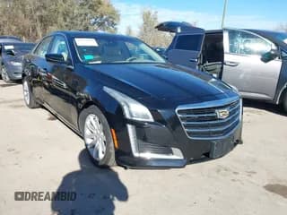 ✅ 2015 Cadillac CTS Luxury AWD • VIN: 1G6AX5SXXF0136980 • Лот: 43617265. Опубликован ранее на IAAI с пробегом 65 000 миль. Бесплатный доступ к архиву аукционных продаж из США и подробный отчёт об истории автомобиля на DreamBid. Изображение 1.