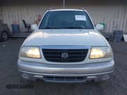 ✅ 2003 Suzuki Grand Vitara • VIN: JS3TD62V834100715 • Lot: 43703710. Wystawiony na IAAI z przebiegiem 138 040 mil. Bezpłatny archiwum sprzedaży aukcyjnych z USA i szczegółowy raport historii pojazdu na DreamBid. Zdjęcie 6.