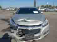 2016 Chevrolet Malibu LTZ z VIN 1G11E5SAXGF105153, wystawiony jako IAAI lot #43159960 z przebiegiem 145 269 mil mil oraz . Historia ofert i sprzedaży dostępna na DreamBid. Obrazek 13.