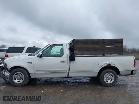 ✅ 1999 Ford F-150 • VIN: 1FTRF17W4XNC23466 • Lot: 43659643. Listed on IAAI with 183,025 mi. Free auction sales archive from the USA and detailed vehicle history report at DreamBid. Image 15.