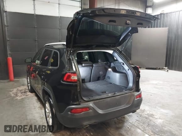 ✅ 2014 Jeep Cherokee Altitude • VIN: 1C4PJMCS0EW220176 • Lot: 42162678. Listed on IAAI with 127,370 mi. Free auction sales archive from the USA and detailed vehicle history report at DreamBid. Image 3.