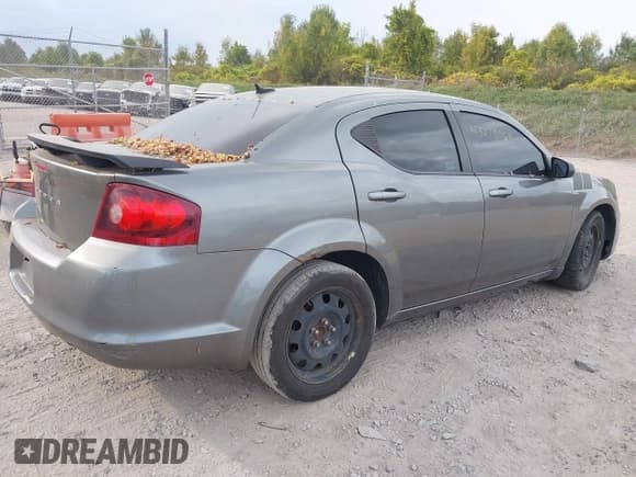 ✅ 2013 Dodge Avenger SE • VIN: 1C3CDZAB6DN594287 • Lot: 43278069. Listed on IAAI with 145,284 mi. Free auction sales archive from the USA and detailed vehicle history report at DreamBid. Image 4.