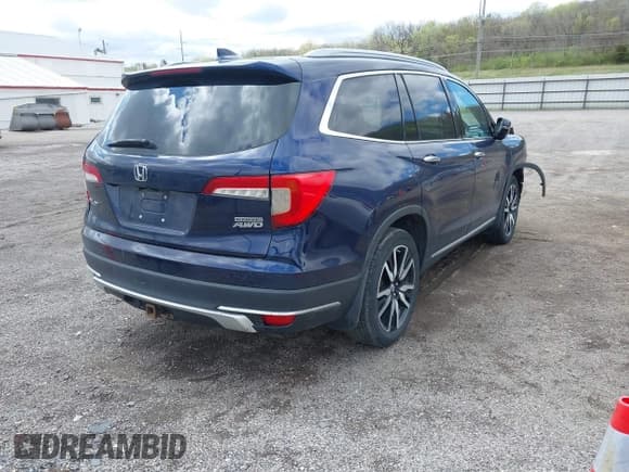 ✅ 2019 Honda Pilot Touring 7-Passenger • VIN: 5FNYF6H68KB001978 • Lot: 42091795. Listed on IAAI with 129,145 mi. Free auction sales archive from the USA and detailed vehicle history report at DreamBid. Image 4.