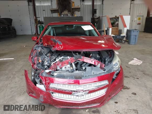 2013 Chevrolet Malibu LTZ with VIN 1G11J5SX9DF236571, listed as a IAAI auction lot 42312073 with 114,404 mi miles and . Bid and sale history available at DreamBid. Image 12.