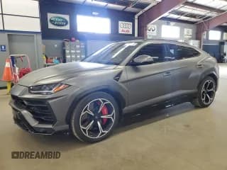 ✅ 2021 Lamborghini Urus • VIN: ZPBUA1ZL4MLA12215 • Lot: 55503385. Wystawiony na Copart z przebiegiem 51 846 mil. Bezpłatny archiwum sprzedaży aukcyjnych z USA i szczegółowy raport historii pojazdu na DreamBid. Zdjęcie 1.