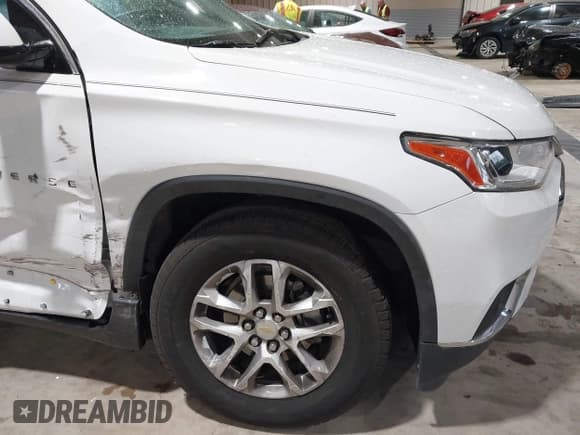 ✅ 2020 Chevrolet Traverse LT Cloth • VIN: 1GNERGKW0LJ132610 • Lot: 41971611. Listed on IAAI with 80,706 mi. Free auction sales archive from the USA and detailed vehicle history report at DreamBid. Image 6.