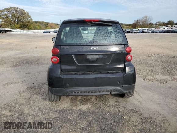 ✅ 2013 Smart fortwo Pure • VIN: WMEEJ3BA4DK656658 • Лот: 82597215. Опубликован ранее на Copart с пробегом 113 545 миль. Бесплатный доступ к архиву аукционных продаж из США и подробный отчёт об истории автомобиля на DreamBid. Изображение 6.