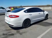 ✅ 2016 Ford Fusion Titanium • VIN: 3FA6P0SU2GR357508 • Lot: 42551834. Listed on IAAI with 177,425 mi. Free auction sales archive from the USA and detailed vehicle history report at DreamBid. Image 4.