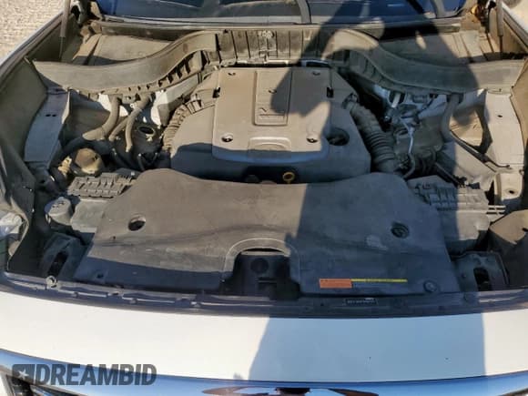 ✅ 2015 Infiniti QX70 • VIN: JN8CS1MU6FM380008 • Lot: 71081085. Wystawiony na Copart z przebiegiem 204 515 mil. Bezpłatny archiwum sprzedaży aukcyjnych z USA i szczegółowy raport historii pojazdu na DreamBid. Zdjęcie 12.