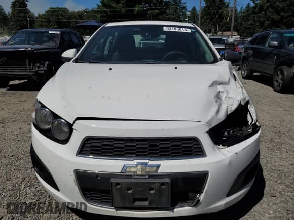 2013 Chevrolet Sonic LT z VIN 1G1JD6SG0D4199810, wystawiony jako Copart lot #63103015 z przebiegiem 128 825 mil mil oraz Szkoda całkowita • Salvage title. Historia ofert i sprzedaży dostępna na DreamBid. Obrazek 5.