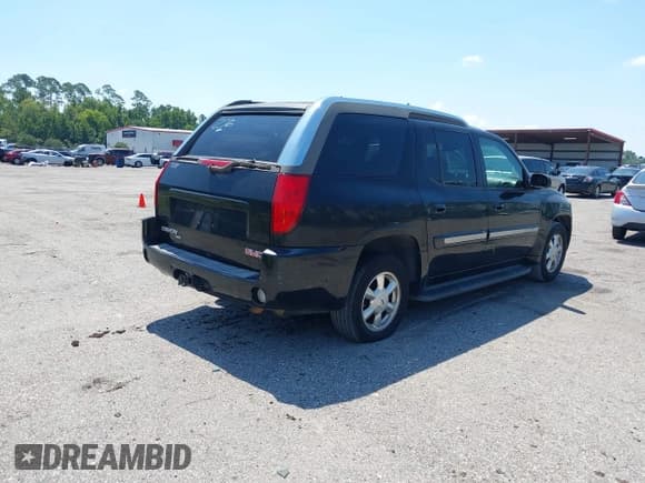 ✅ 2004 GMC Envoy SLE • VIN: 1GKES12S346183549 • Lot: 42843645. Listed on IAAI with 180,113 mi. Free auction sales archive from the USA and detailed vehicle history report at DreamBid. Image 4.