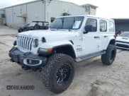 ✅ 2021 Jeep Wrangler Unlimited Sahara • VIN: 1C4HJXEN3MW717895 • Lot: 41472929. Listed on IAAI with 58,001 mi. Free auction sales archive from the USA and detailed vehicle history report at DreamBid. Image 17.