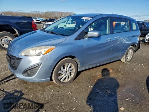 ✅ 2012 Mazda 5 Sport • VIN: JM1CW2BL9C0100875 • Lot: 94164865. Listed on Copart with 164,477 mi. Free auction sales archive from the USA and detailed vehicle history report at DreamBid. Image 1.
